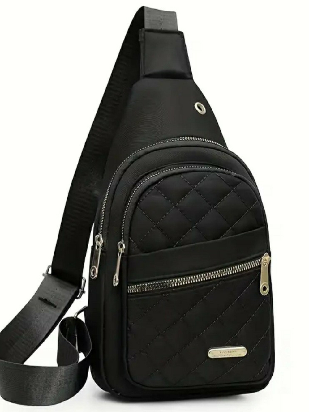 Compact black quilted sling bag with multiple zip pockets for an organized day.